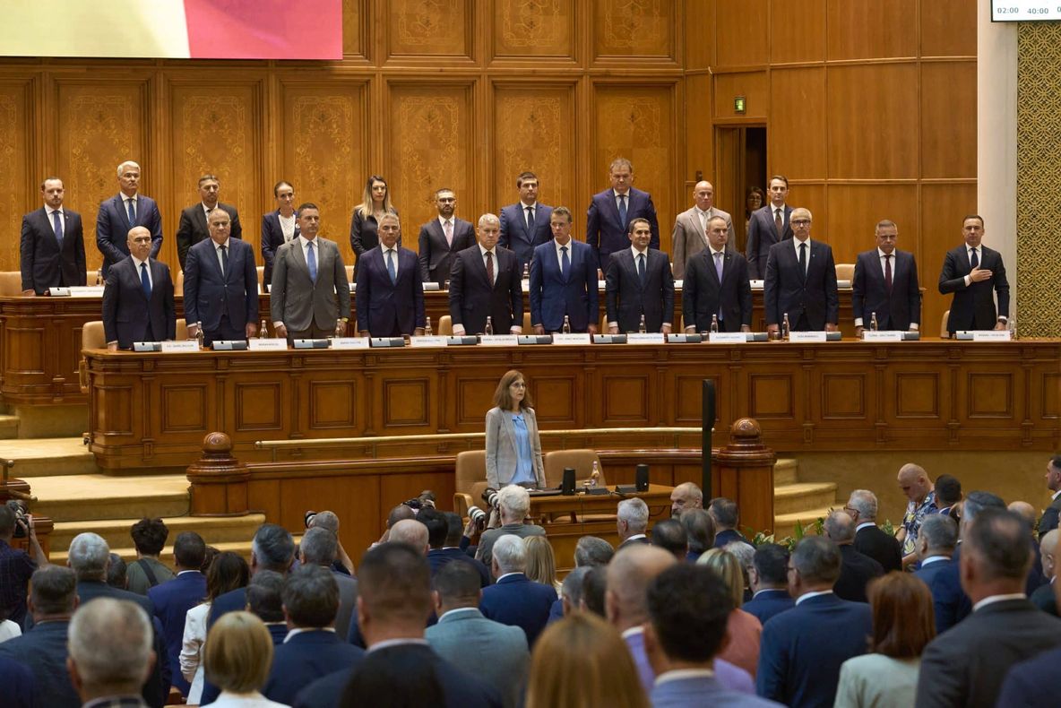 AUR DENUNȚĂ " MASCARADA" GUVERNULUI BOLOJAN: "O COALIȚIE ÎMPOTRIVA POPORULUI ROMÂN"