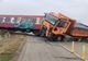 Camion lovit de tren, oameni răniți